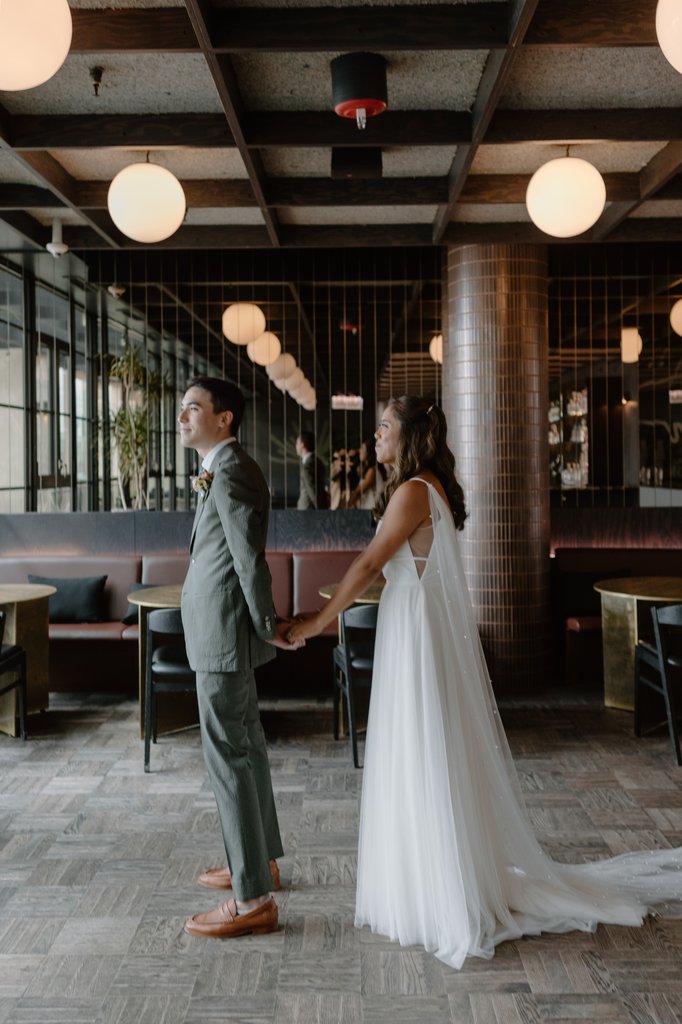 a heartwarming moment between a bride and groom at selva chicago located in the emily hotel fulton market