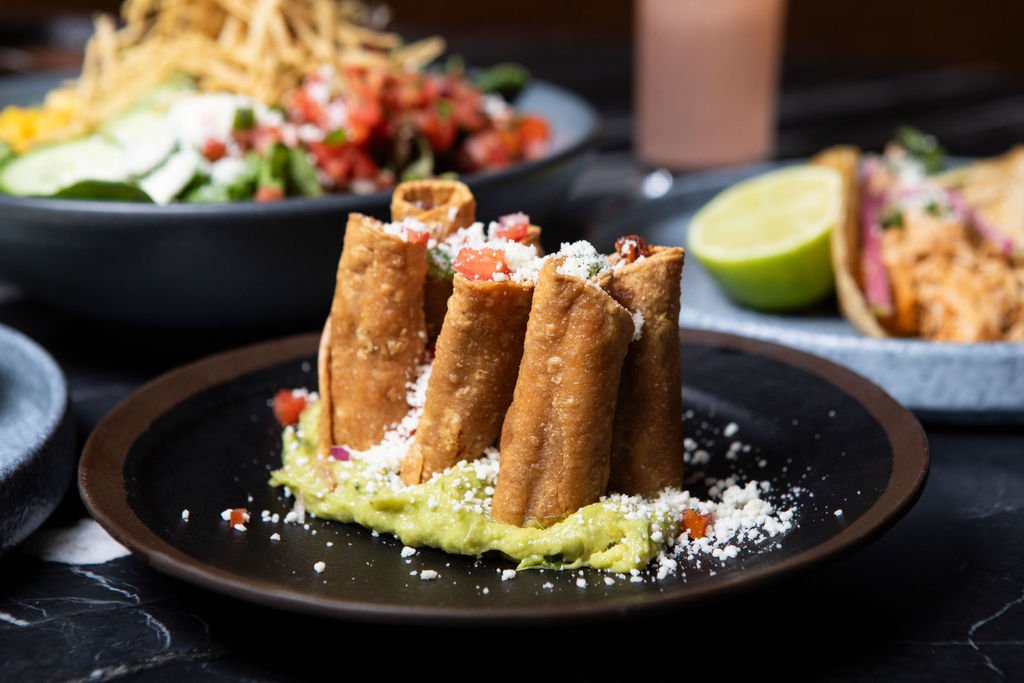 mexican plate with mini flautas and salsa at selva chicago the emily hotel fulton market